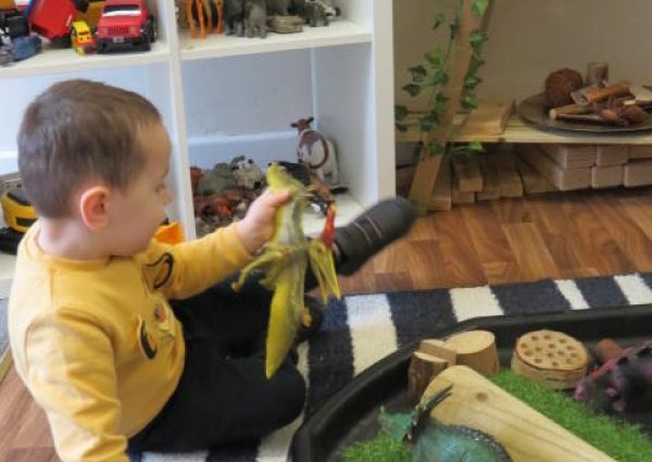 boy playing at George Eliot Kindergarten Coventry